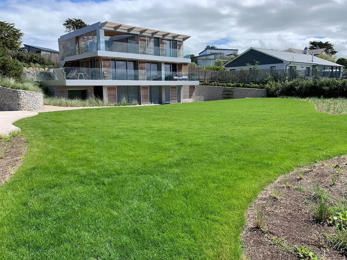 Large, well-kept lawn at a rural property in Cornwall